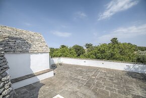 Trullo Grotta Cisternino by Typney