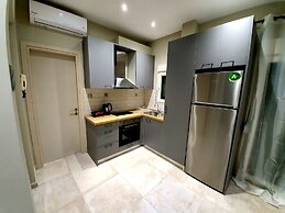 Cosmopolitan Apartments Nilie Suites & Aprts
