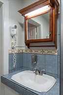 Prado Inn & Suites