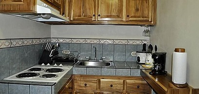 Prado Inn & Suites