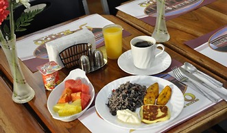Prado Inn & Suites