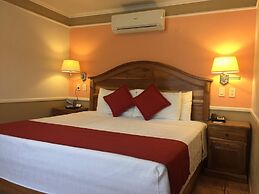 Prado Inn & Suites