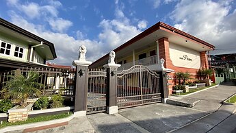 Prado Inn & Suites