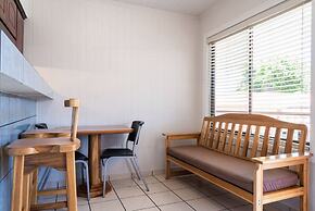 Prado Inn & Suites