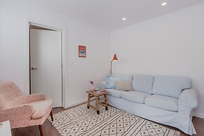 Sunny Apartment with Patio, By TimeCooler