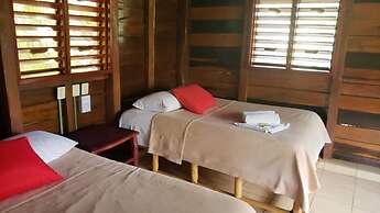 Cabanas k'iin Yéetel Há Bacalar