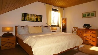 Ferienwohnung im Wald mit Kamin
