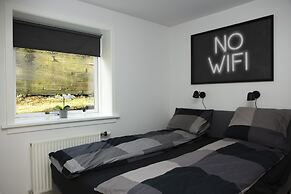 Mørk Apartments
