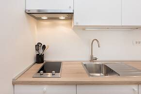 Spacious and Modern Central Triplex- Free Parking!