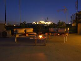 Psirri Artistic Rooftop Apartment with Acropolis View