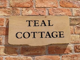 Teal Cottage