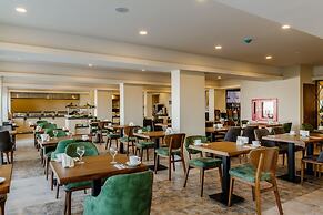 Olivia Palm Hotel