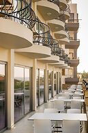Olivia Palm Hotel