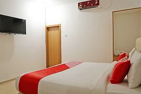 Hotel O M Authentic Kost Man
