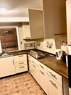 Luks Apartments