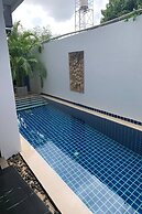 One World One Home Naiharn Hotel