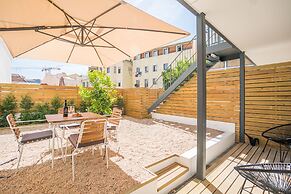 Wood Wall & Garden Apartment
