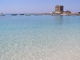 Baia del Conte Apartments