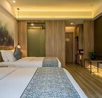Vyluk J Hotel National Plaza Xinping