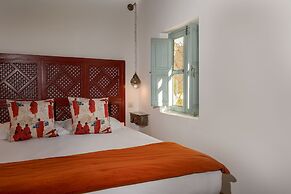 Riad Le J