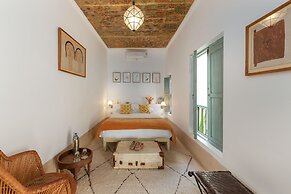 Riad Le J