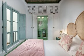 Riad Le J