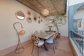 Riad Le J