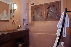 Riad Le J