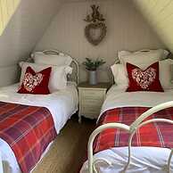 a Fairytale Thatched Highland Cottage