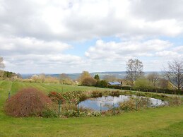 Hillside Retreat With Pond