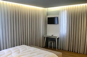 A Rendilheira Charming Suites.