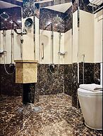 Al Ertiqaa Hotel