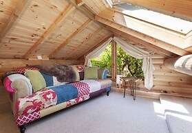 Porthole Log Cabin