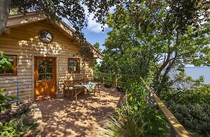 Porthole Log Cabin