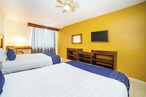 Capital O Hotel Casa Blanca
