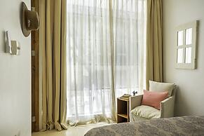 Calalily Aldea Zama by Homing Bird