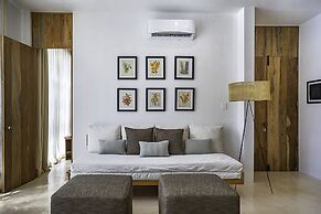 Calalily Aldea Zama by Homing Bird