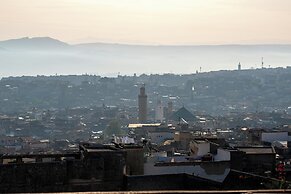 Riad Layalina