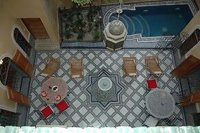 Riad Layalina