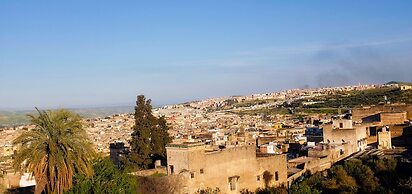 Riad Layalina
