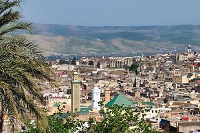 Riad Layalina