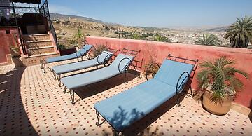 Riad Layalina