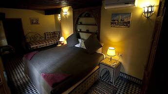 Riad Layalina