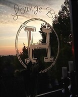 LE H - Hôtel & Restaurant