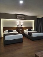 Estanza Hotel & Suites