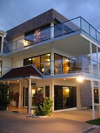 By the Bay Beachfront Apartments