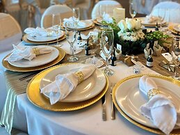 Astur Hotel y Suites
