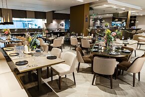 York Medellin, Curio Collection by Hilton