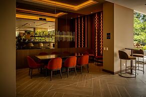 York Medellin, Curio Collection by Hilton