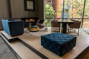 York Medellin, Curio Collection by Hilton